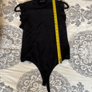 Bebe women’s black thing body suit.
